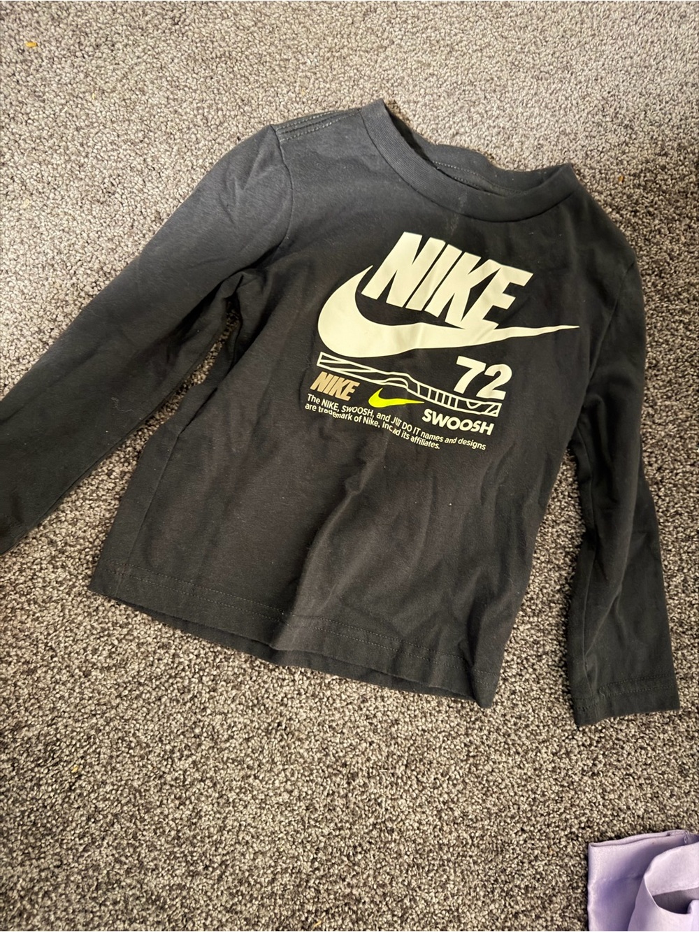 Nike Kids Black Long-Sleeve Graphic Tee with Cream Logo